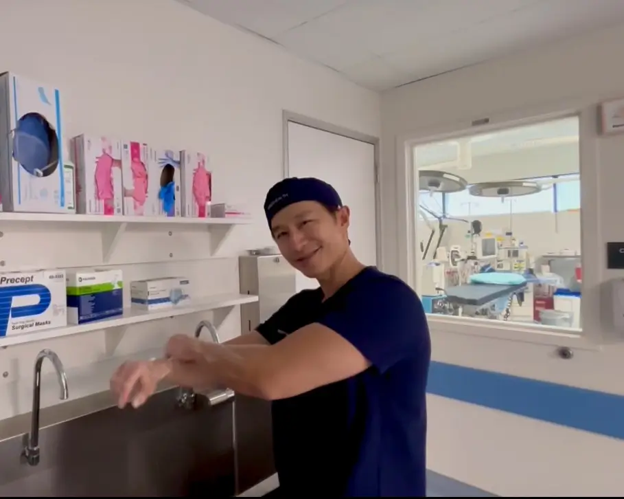 Albert Wong, MD Scrubbing In Before Surgery